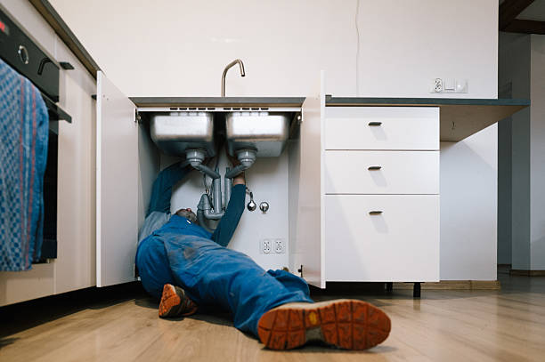 Professional Drain Cleaning technician working in Orlinda, TN